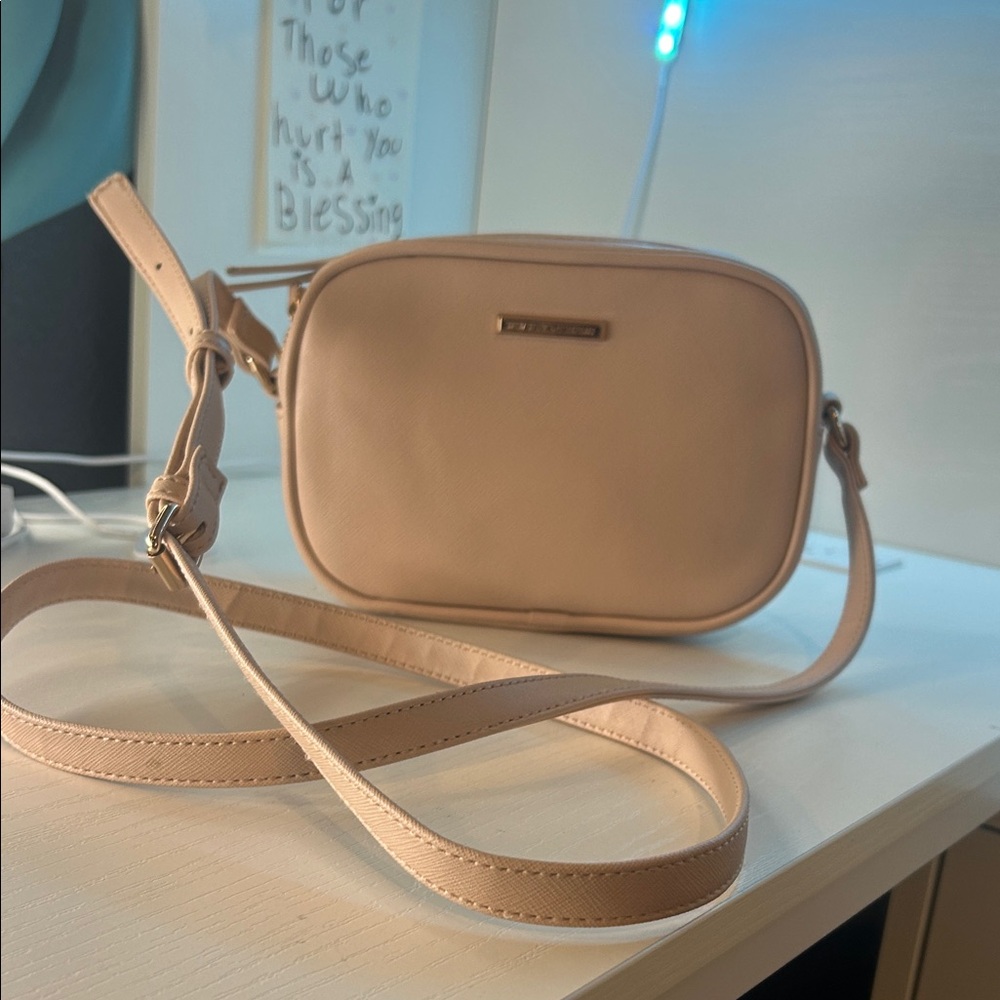 New York & company pink faux-leather crossbody bag.